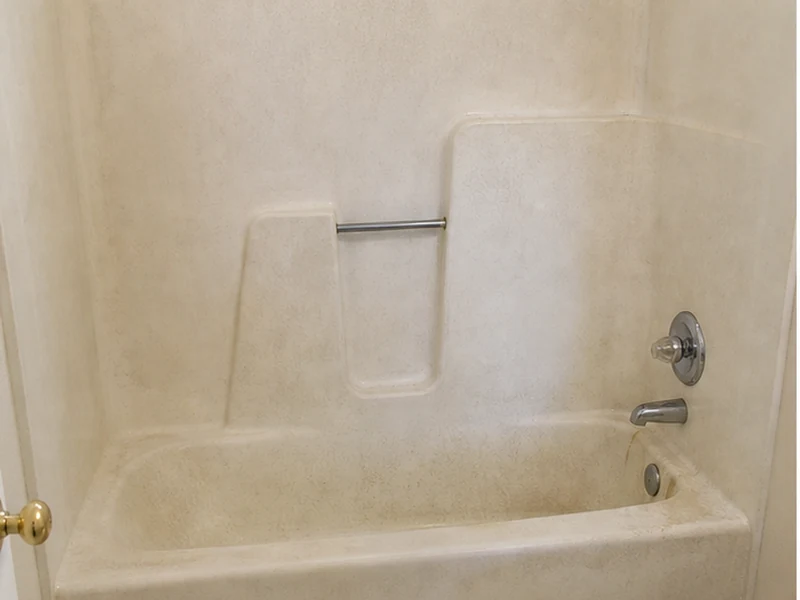 Chalky crazed fiberglass bathtub in a Centerville apartment before refinishing, Fremont