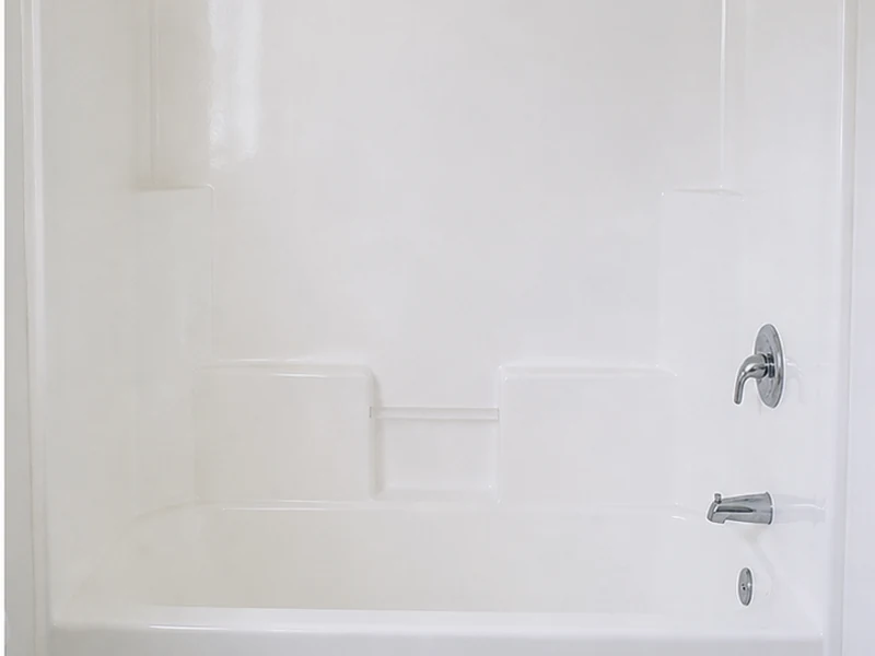 Same fiberglass tub-shower combo refinished to a smooth even white gloss in a Centerville apartment, Fremont